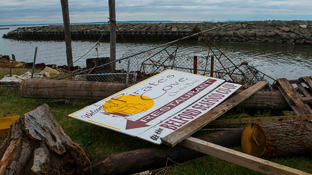 Pirate's Cove Restaurant Sign Amid Debris from Hurricane Sandy